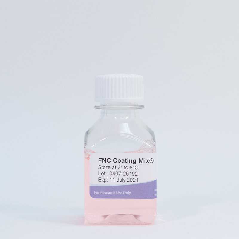 Pink liquid in labeled research bottle.