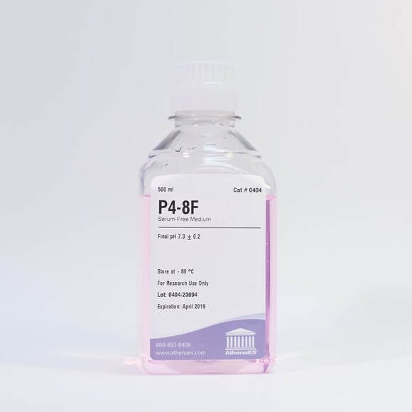 Pink serum-free medium in a clear bottle.